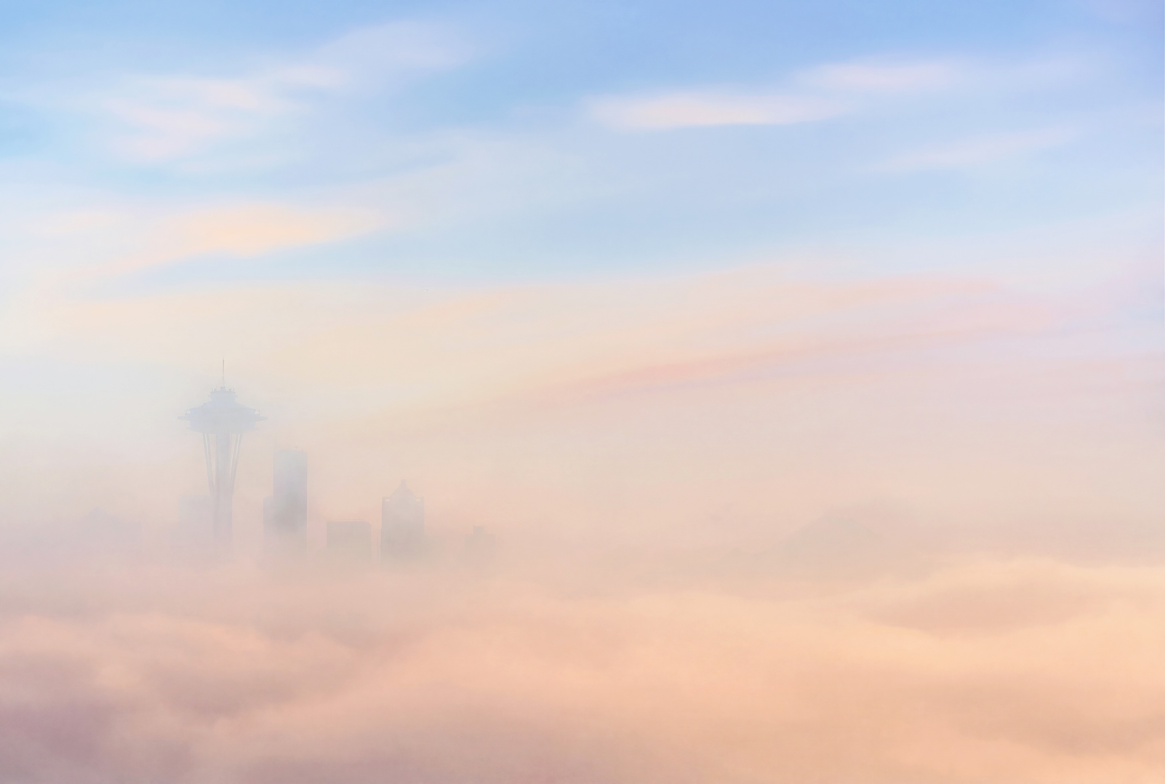 Flat gray pre-dawn conditions from a city viewpoint with no skyline visibility.